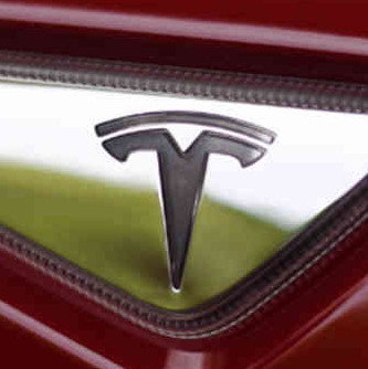 Tesla Emblem on silver and red background