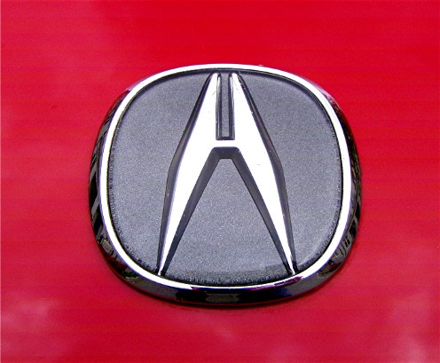 Acura Logo on Red Background
