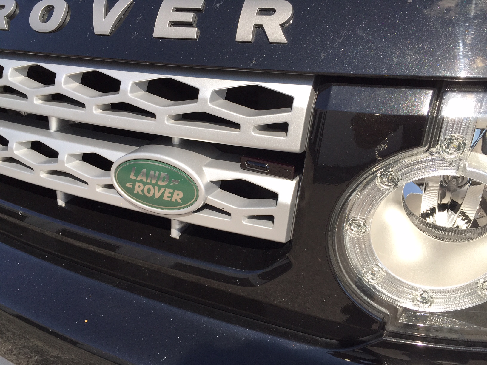 Custom K40 Police Laser Jammers Driver Side Installed on 2013 Land Rover in Largo, FL
