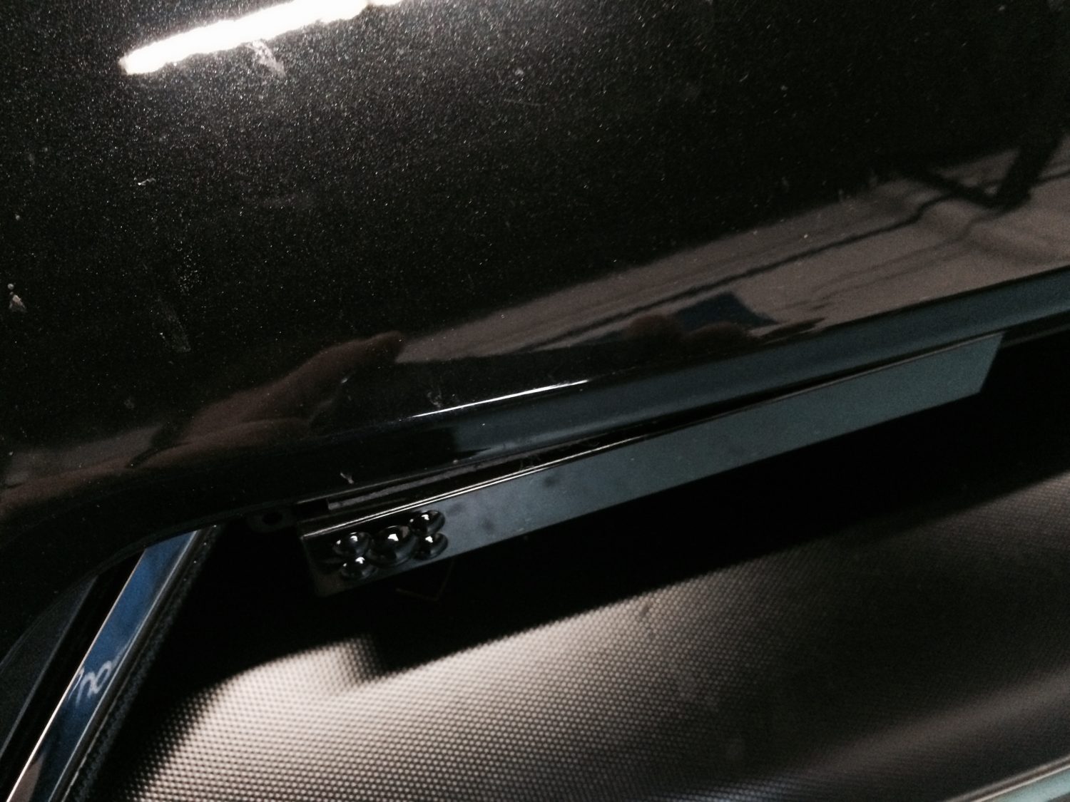 K40 laser defuser closeup on a 2015 Nissan GT-R